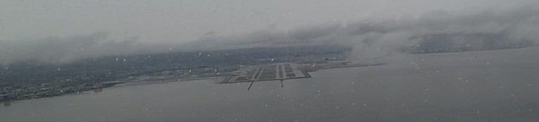 Langley Flying School's Piper Seneca on approach to San Francisco International Airport. Pilot: Carl Biagioni